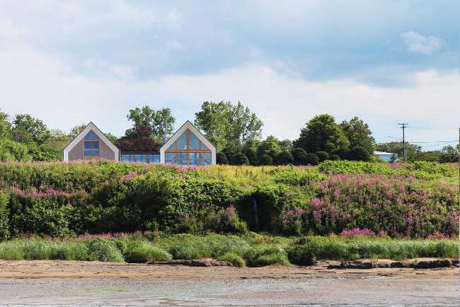 Wooden house in green nature